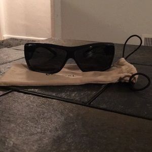 Black Chanel sunglasses with case